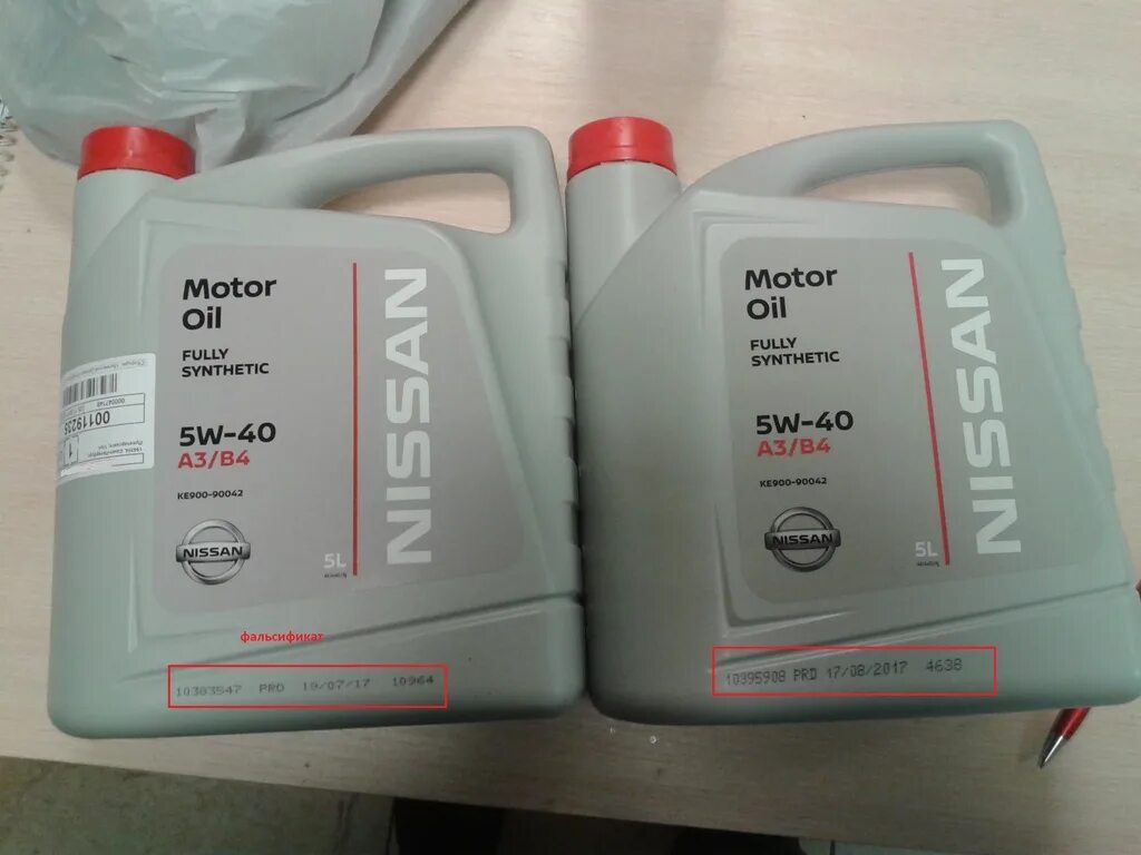 Ниссан на подлинность. Поддельное масло Nissan 5w40. Ниссан 5w40 черная канистра. Nissan 5w30 черная канистра. Моторное масло Ниссан 5w30.