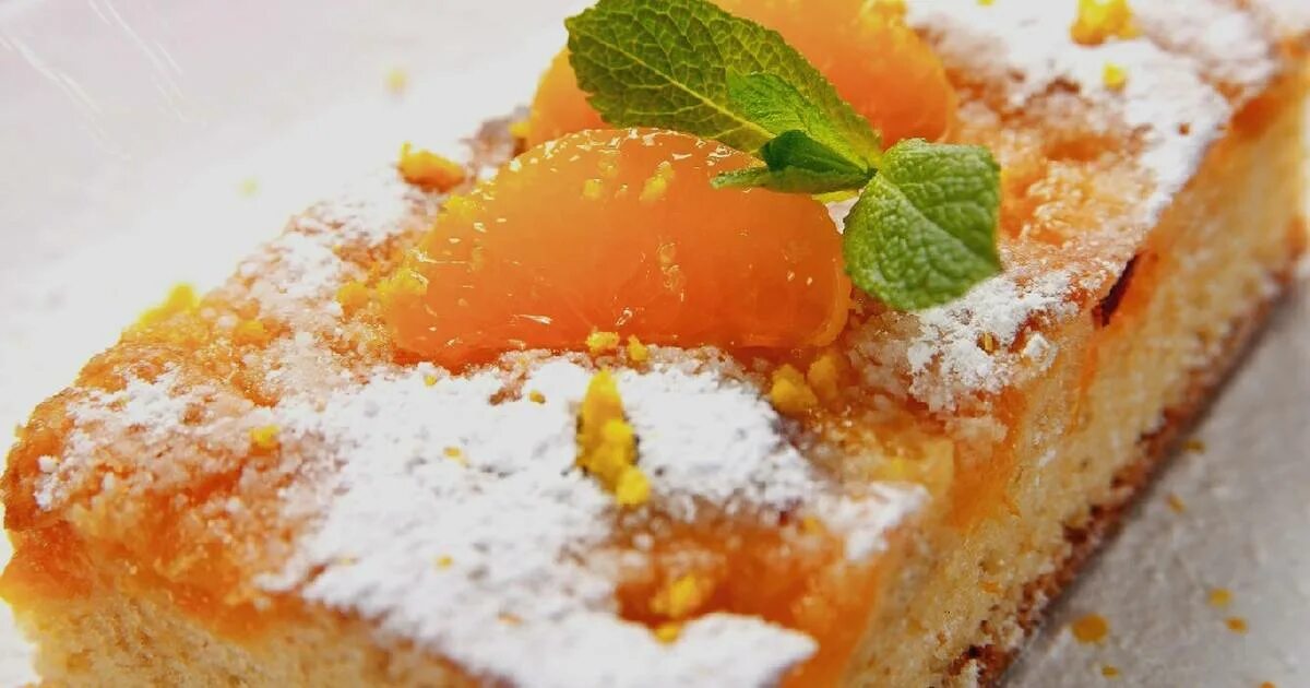 Кекс рождественский с сухофруктами и цукатами. Кекс с мандаринами. Мандариновый кекс. Рождественский кекс мазурка. Как украсить рождественский кекс мандаринами.