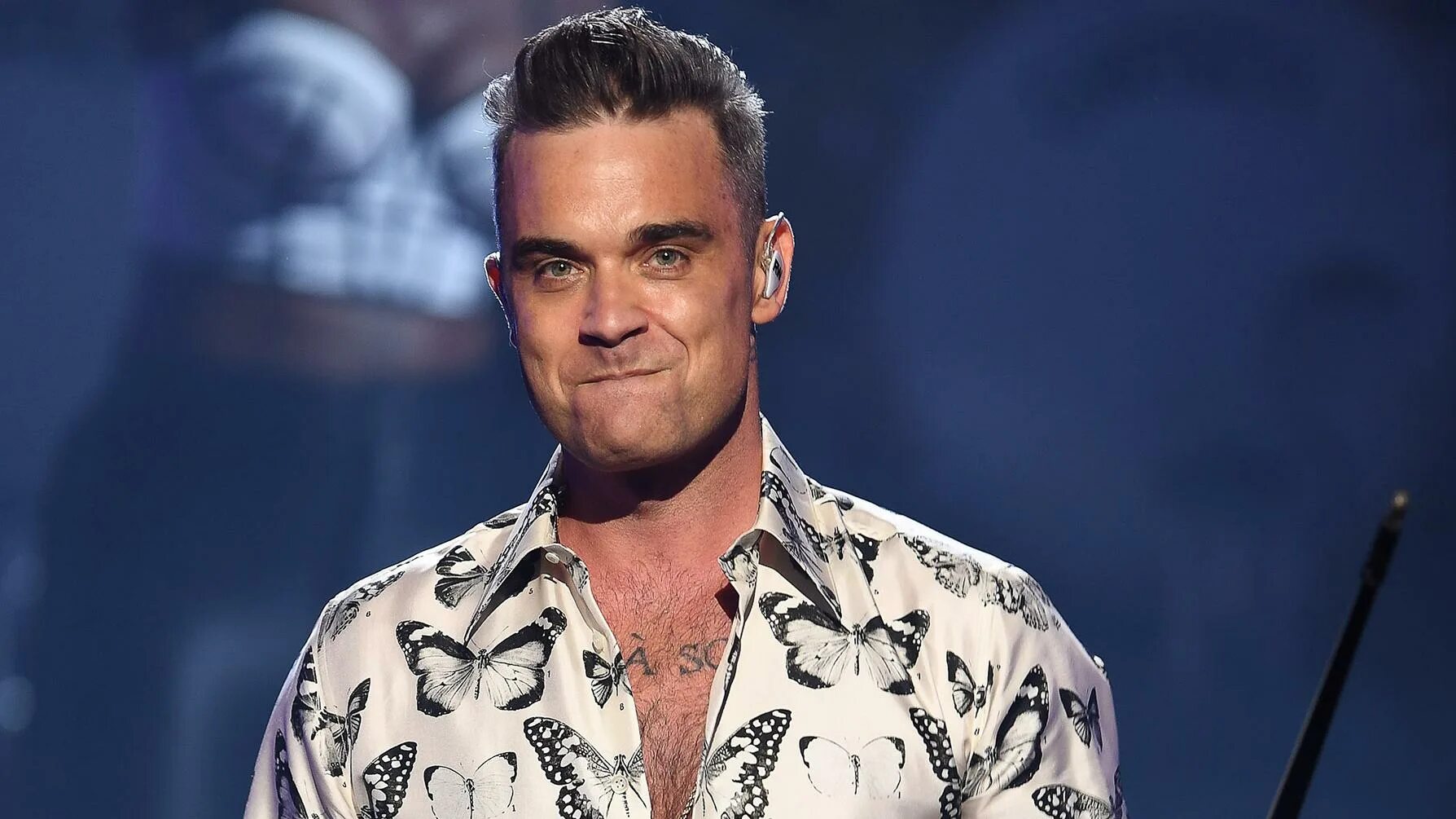 Песня английский певец. Робби Уильямс. Robbie Williams певец. Робби Уильямс фото. Робби Уильямс 2024.