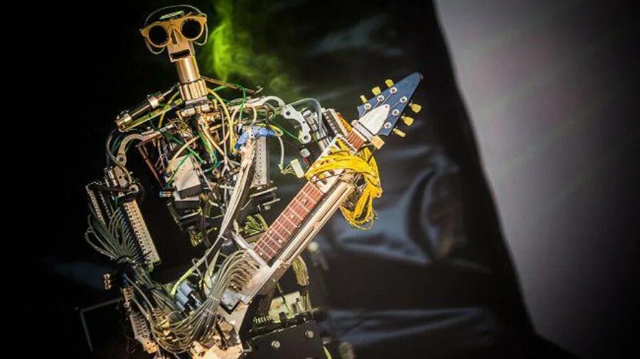 Музыкальная группа роботы. Группа compressorhead. робот гитарист. рок группа из роботов. музыкальная рок группа роботов.