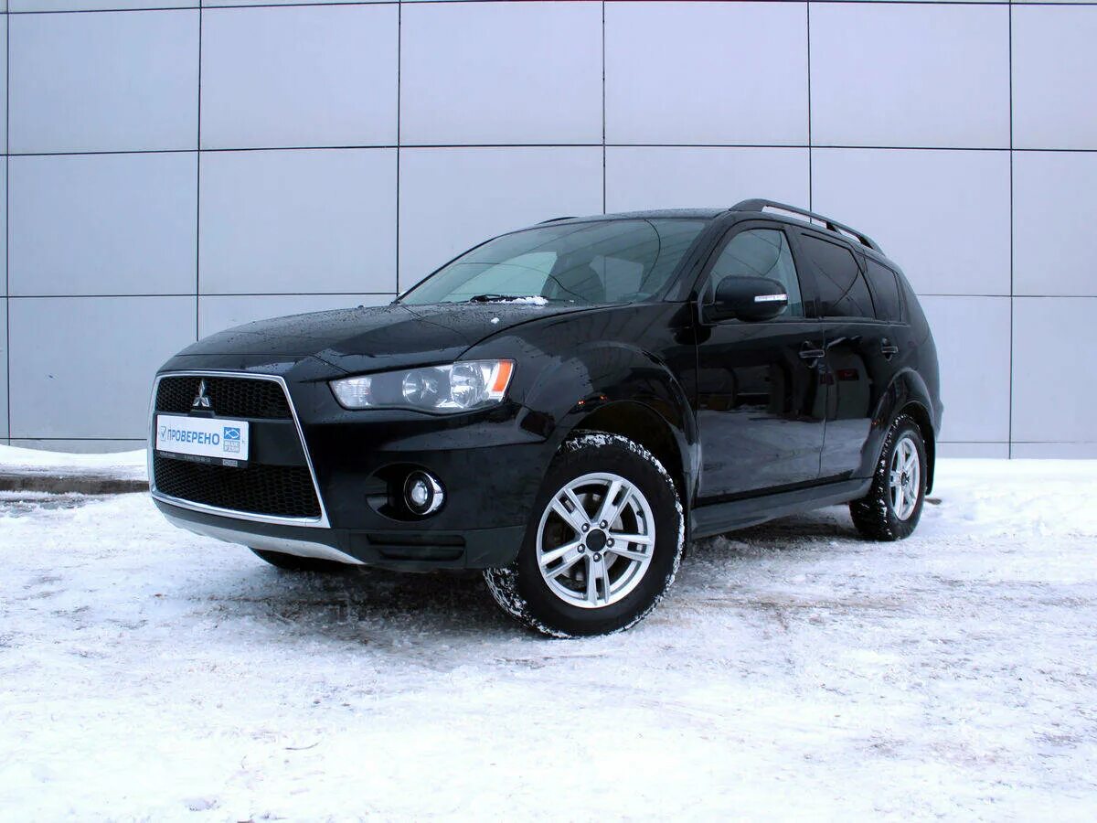 Mitsubishi outlander xl 2012. Аутлендер XL 2012. Митсубиси Аутлендер XL 2012. Mitsubishi Outlander XL дорестайлинг. Mitsubishi Outlander XL 2010.