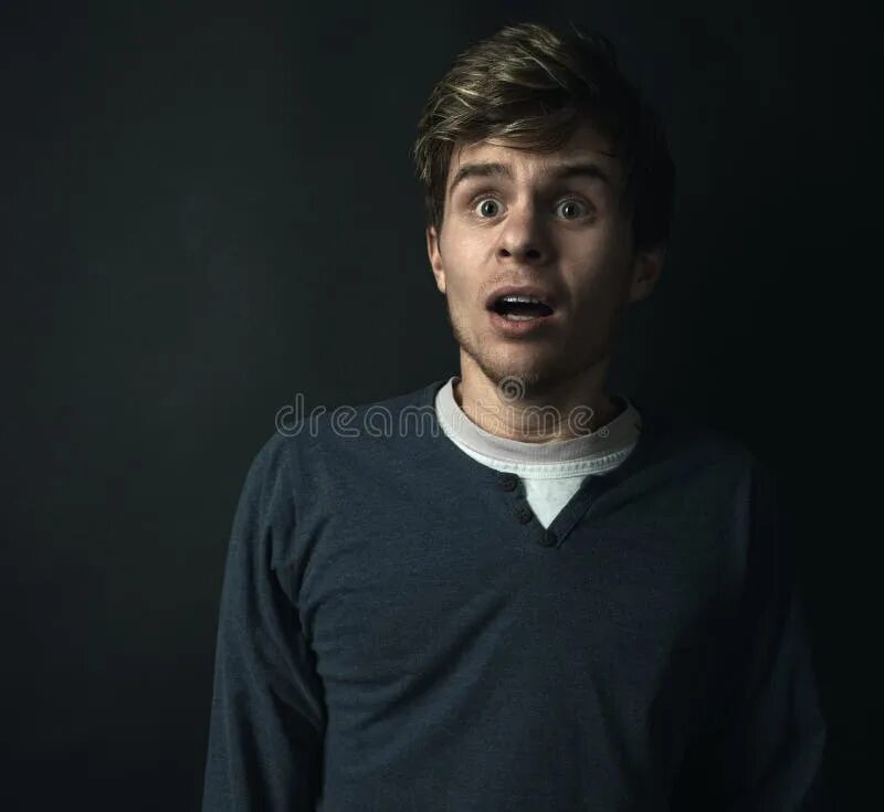 I was very scared. Scared guy. scared guy stock. guy frightened of the bright light. the guy is scared.