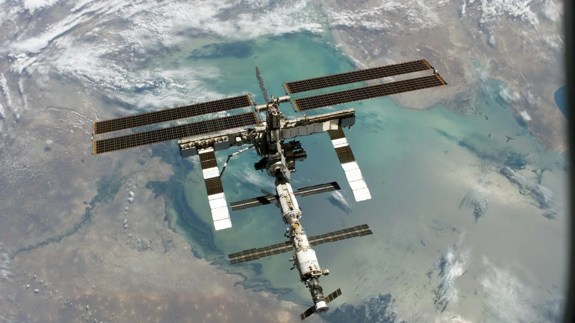 Сколько орбитальных станций в космосе. Международная Космическая станция МКС. Космическая орбитальная станция МКС. Международная Космическая станция ISS. Спутник НАСА станция МКС.