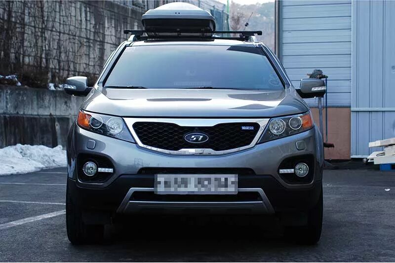 Киа соренто безопасность. Kia XM Sorento 2012 оптика. Kia Sorento 2012 ходовые огни. Киа Соренто 2009. Kia Sorento 2012 ДХО.