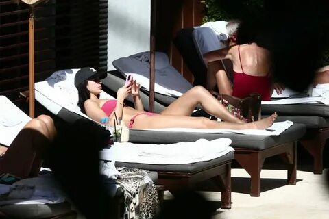 DUA LIPA in a Pink Bikini at a Pool in Miami 02/06/2022.