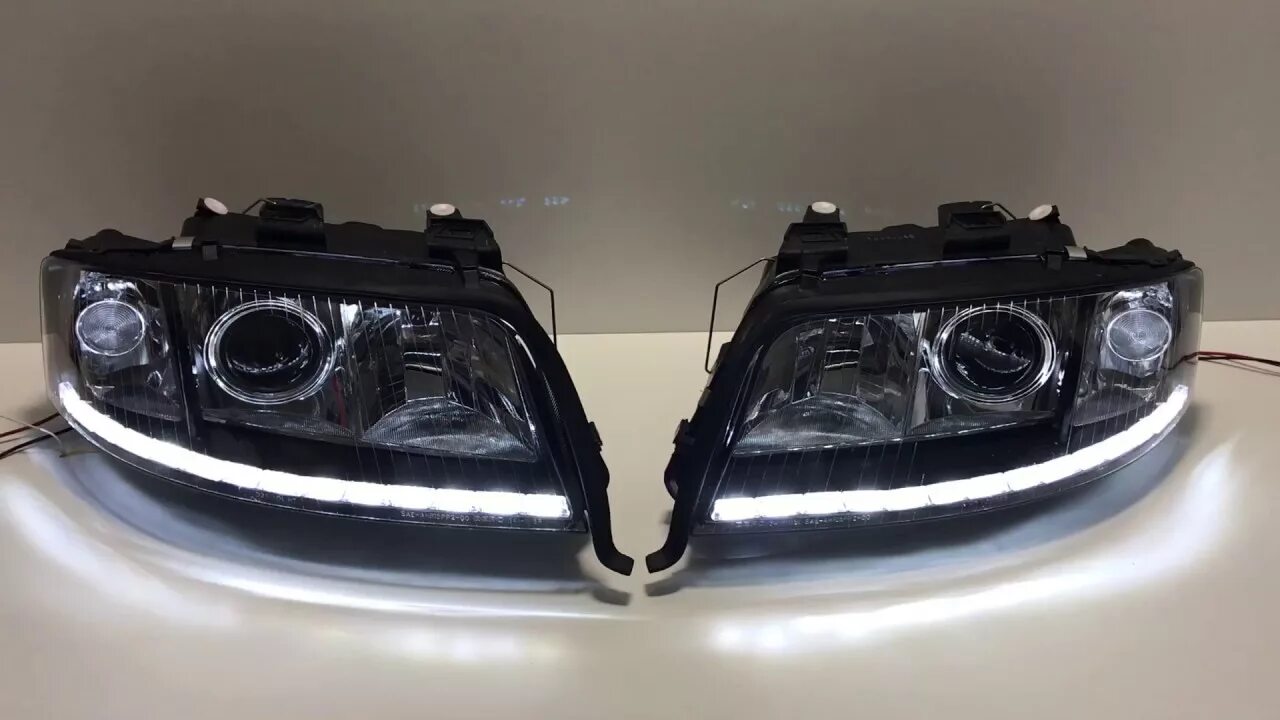 Фара а6 с5 купить. Фары Ауди а6 с5. Led фары Ауди а6 с5. Фара Audi a6 c5 HELLA Black. Led фары передние Audi a6 c6.