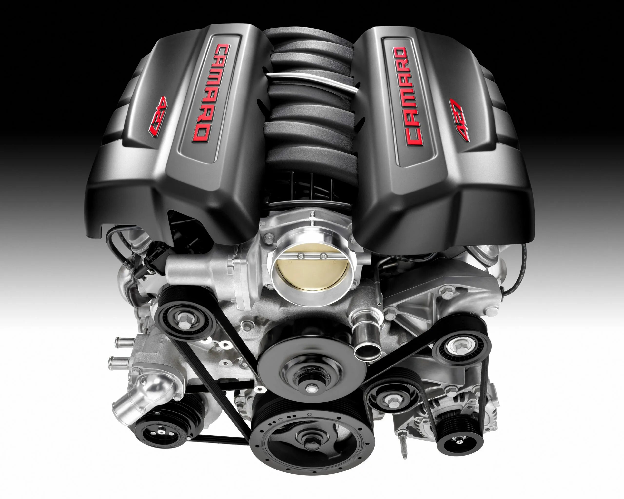 Обзор двигателей автомобилей. Chevrolet Camaro v8 мотор. Двигатель ls7 v8. Двигатель Шевроле в8. Камаро 6.2 v8.