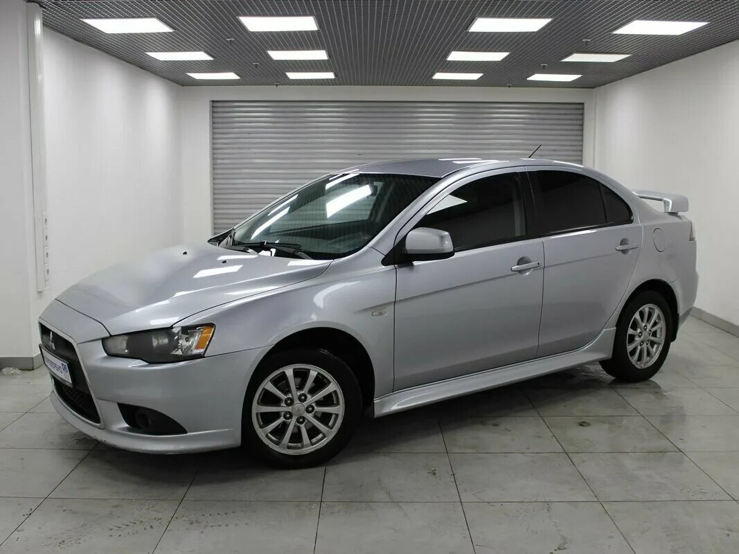 Митсубиси лансер 10 1.8 купить. Mitsubishi Lancer x 2012. Mitsubishi Lancer x Рестайлинг 2012. Mitsubishi Lancer 2012. Лансер 10 1.8.