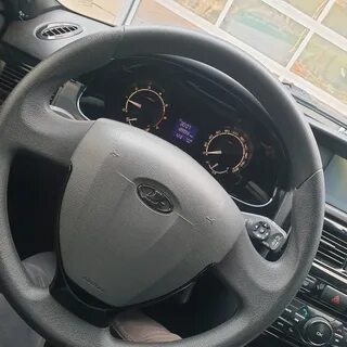 Значок приоры на руле
