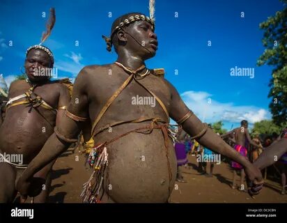 Bodi Tribe Fat Men Running During Kael Ceremony, Hana Mursi, Omo Valley, Et...