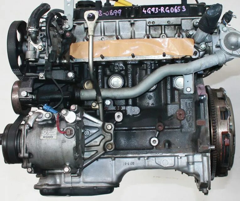 Номер двигателя мицубиси. Двигатель Митсубиси 4g93. Мотор MPI 4g93. Двигатель 4g93 MPI. 4g93 1.8 MPI.