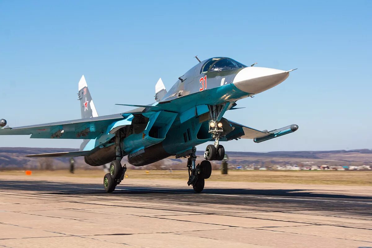 Фото су. Истребитель Су 34м. Су-34 бомбардировщик. Су34 самолет. Самолет утенок Су 34.