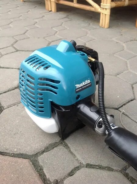 Триммер бензиновый Makita em2500u. Триммер Makita em 2500 u. Мотокоса Makita em2500u. Makita em2500u