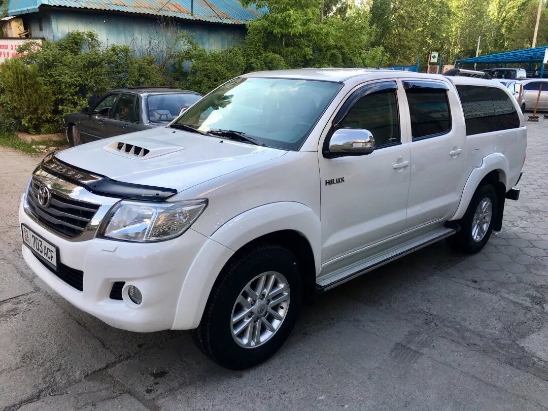 Тойота хайлюкс 2012 цена. Toyota Hilux 2012. Тойота Hilux 2012. Hullix Toyota Hilux 2012. Тойота Хайлюкс 2012 белый.