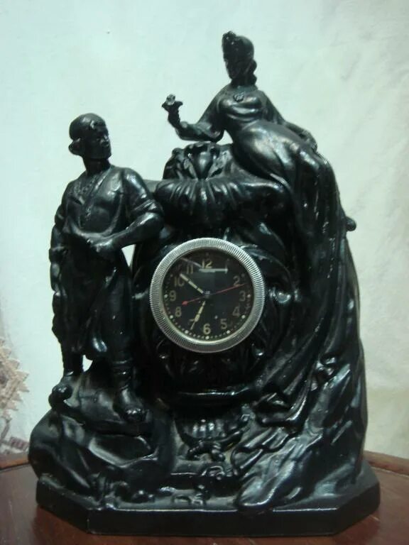 Чугунные часы. Часы чугунные хозяйка медной горы. часы &quot;хозяйка медной горы&quot; ссср, силумин.. ипп часы &quot;хозяйка медной горы&quot;. каминные часы хозяйка медной горы.