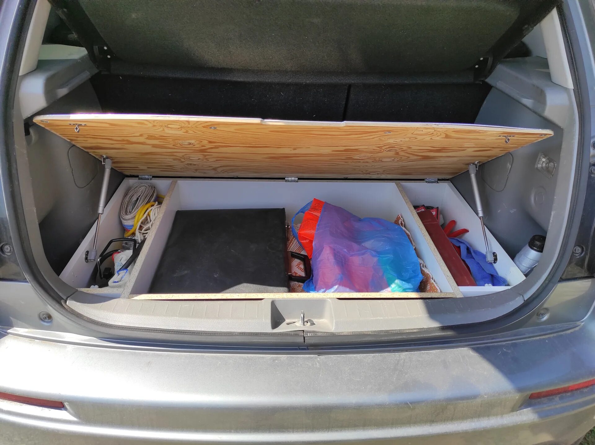 Ниши багажника приора. Боковой карман в багажник шеви нивы. Пенал в багажник. Органайзер в багажник hyundai i40. Лодочный мотор 9.