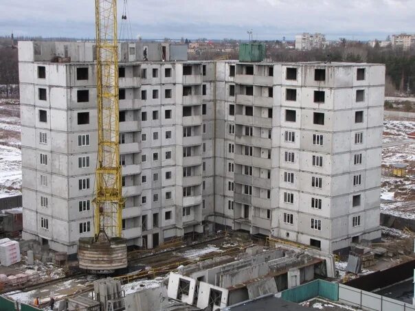 Как строится панельный дом. Стройка многоэтажного дома. строящийся многоэтажный дом. панельное домостроение. панельный дом стройка.