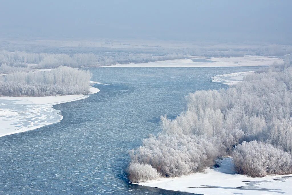 Река волга изменяется в разные времена года. Ледостав на реке Енисей. Река Дон ледостав. Река Енисей зимой. Зима на реке Енисей.