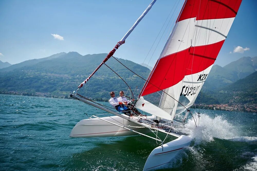 Solar sailing. Парусный TOPCAT k1. K2red катамаран. Парусный катамаран Накра. Минимакс парусный катамаран.