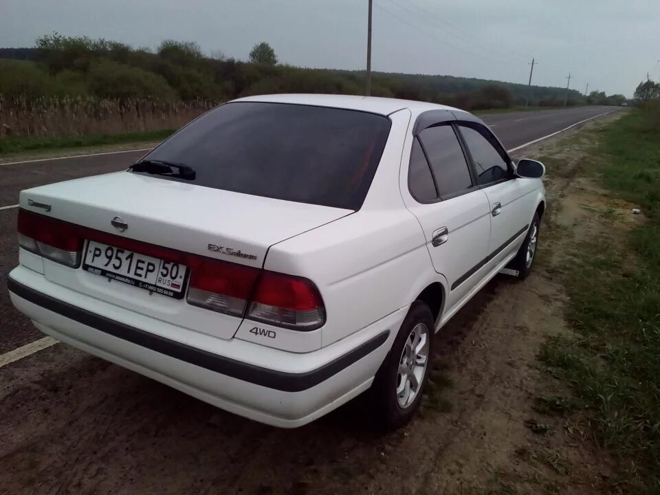 Ниссан санни край. Ниссан Санни b15. Ниссан Санни 2001 1.8. Nissan Sunny b15 r17. Ниссан Санни 175 л.с.