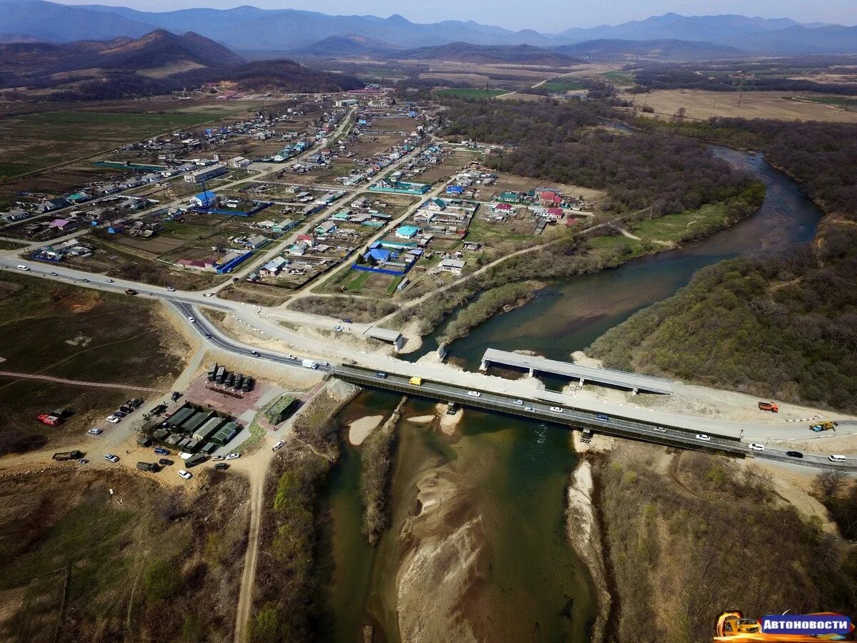 Новолитовск. Временный автомобильный мост. Село новолитовск приморский край. Река литовка приморский. Сталежелезобетонные мосты.
