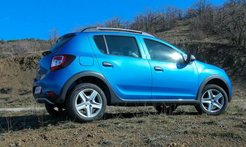 Логан степвей размеры дисков. Renault sandero stepway 2013. рено сандеро степвей 2013. сандеро степвей 2013. renault sandero stepway 2014.