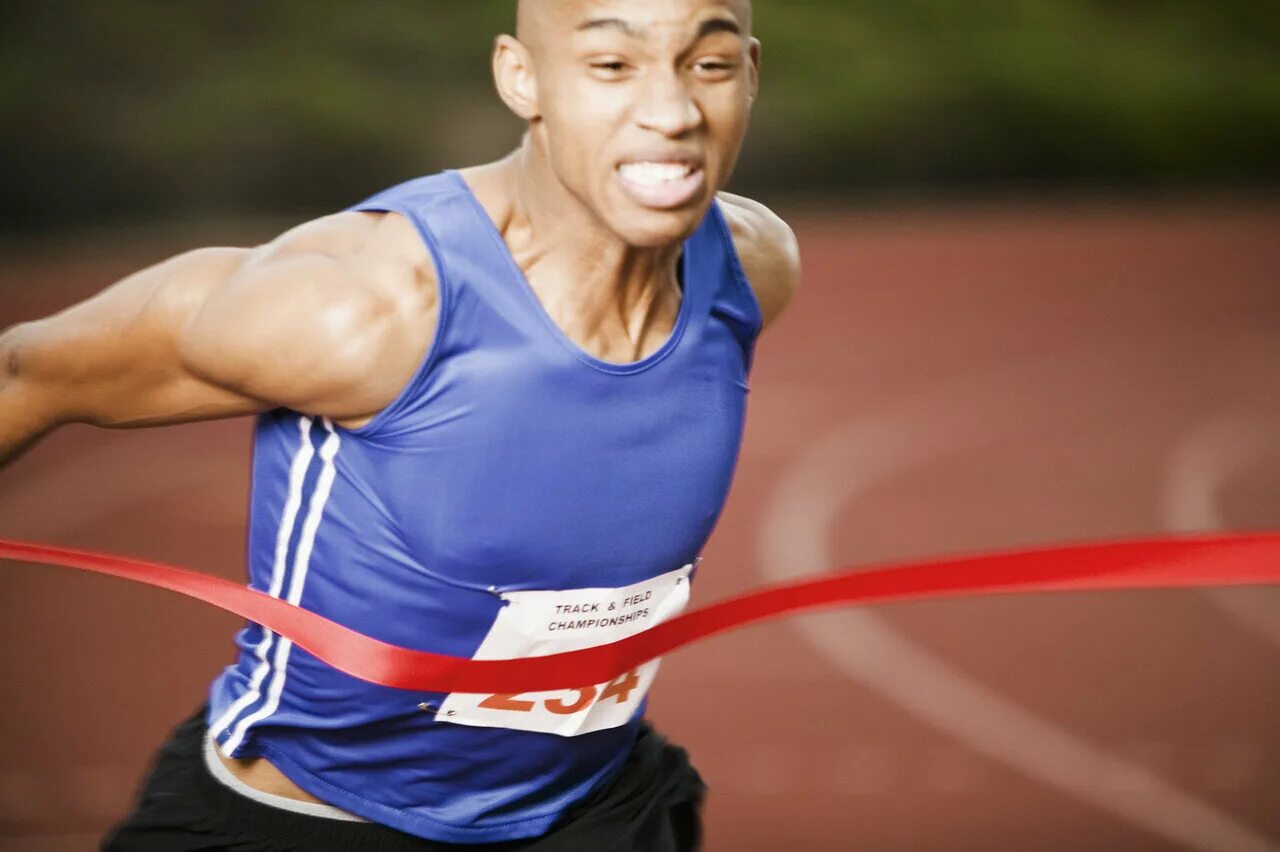 University sports festival boys athletes. Спортсмен на финише. Бегун на финише. Марафонец на финише. Бег финиш.