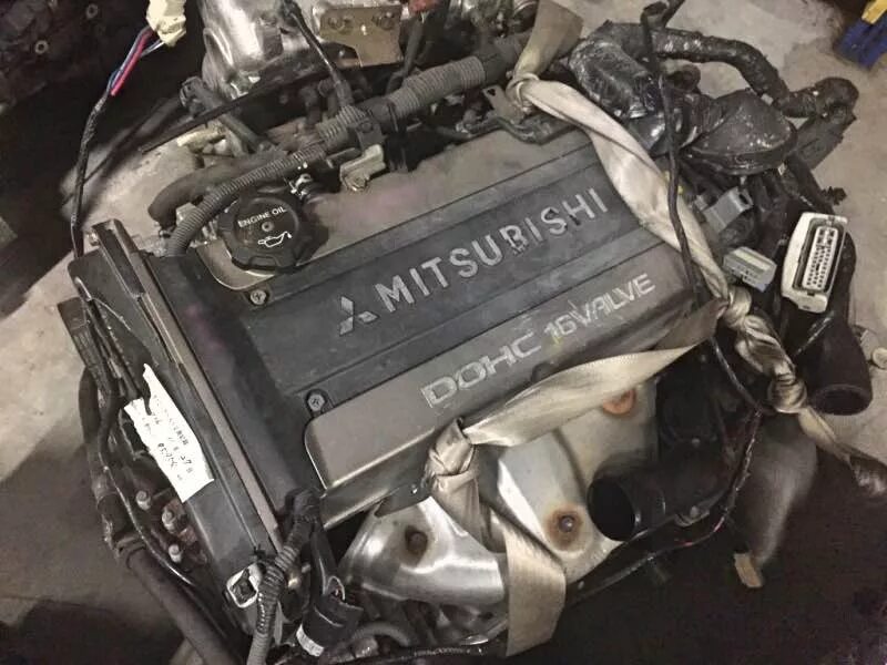 Двигатель Mitsubishi 4g63. Мотор Mitsubishi Galant g 4 63. Двигатель 4g63 Мицубиси 2.4. Двигатель 4g63 Mitsubishi Galant.
