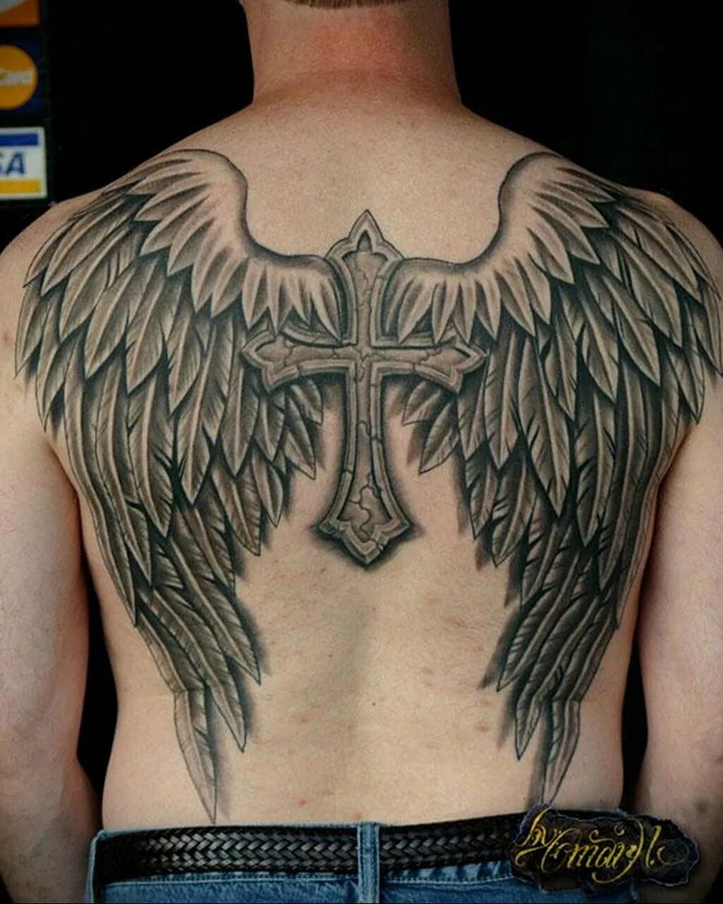 Мужская спина крылья. Татуировки на спине. Татуировки на спине мужские. Тату Крылья на спине. Крылья на спине тату мужские.