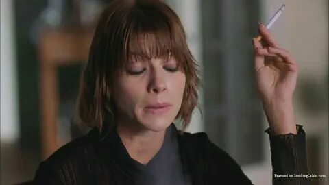 SmokingCelebs.com--Lauren German smoking cigarettes.