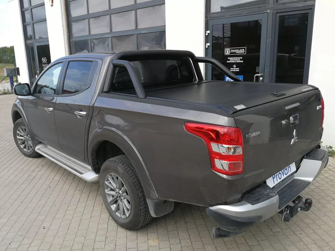 Мицубиси л200 багажник. Крышка кузова mitsubishi l200 2025. mitsubishi l200 кузов. дуги для мицубиси л200. mitsubishi l200 2025.