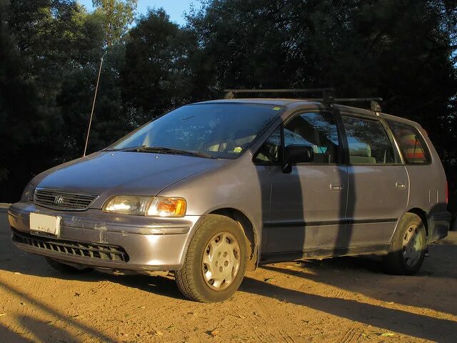 Хонда одиссей 1999. Хонда одиссей 4вд. Хонда одиссей 1999 битая. Honda odyssey 4wd. Одиссея 1999.