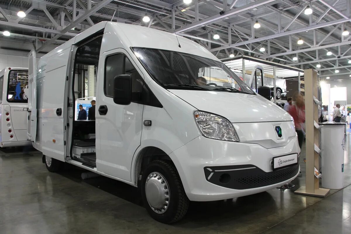 Электрическая газель next. Электроавтобус газель некст. Газель некст комтранс. Электроавтобус газель некст. Газель некст 2021.