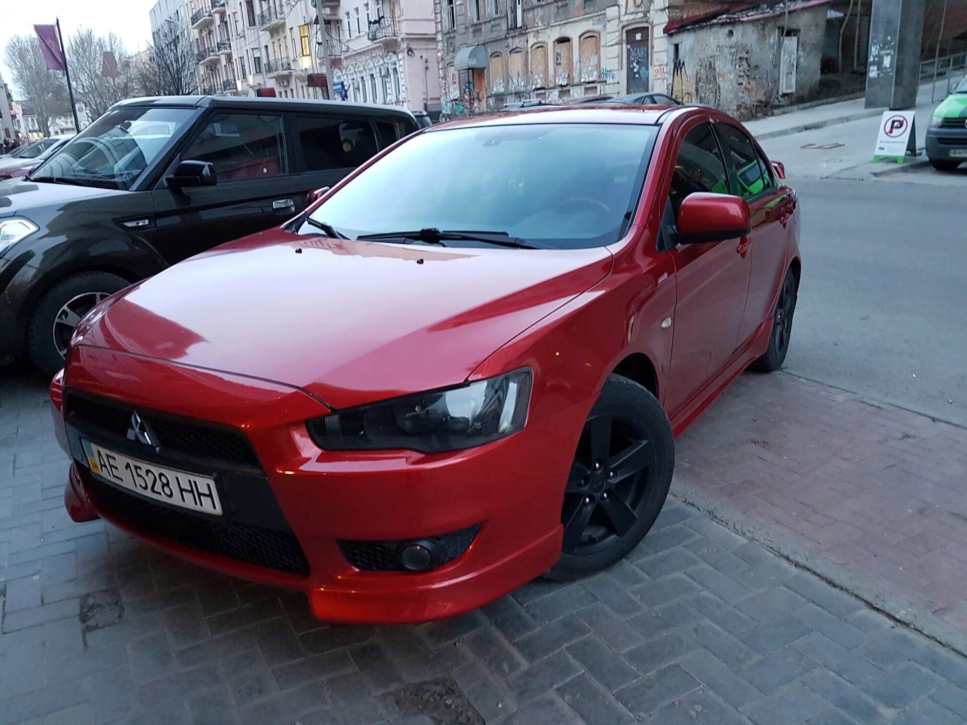 Купить новую митсубиси спб. Мицубиси Лансер новый красный. Mitsubishi Lancer 10 комплектация 2014 год. Лансер 10 максимальная комплектация. Лансер 10 новый.