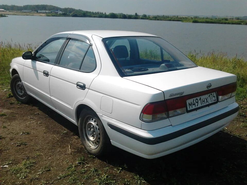 Ниссан санни годы выпуска. Ниссан Санни 92. Nissan Sunny 2000. Ниссан Санни b15. Ниссан Санни 92 года.