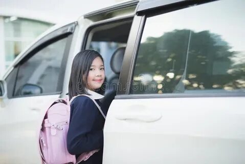 She go to work by car