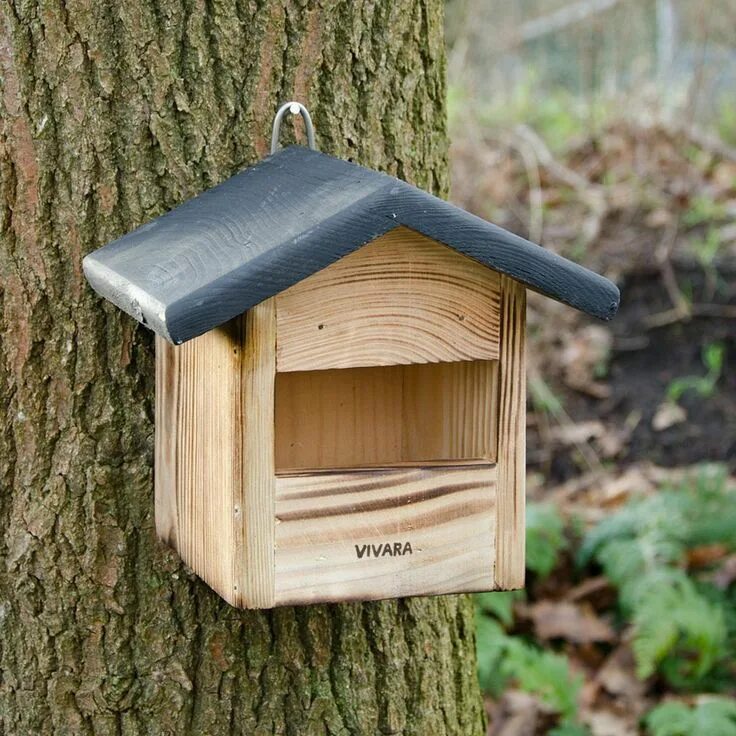 Open nest. Мухоловник. nest box. birds nest box. craftsman is making wood bird nest.