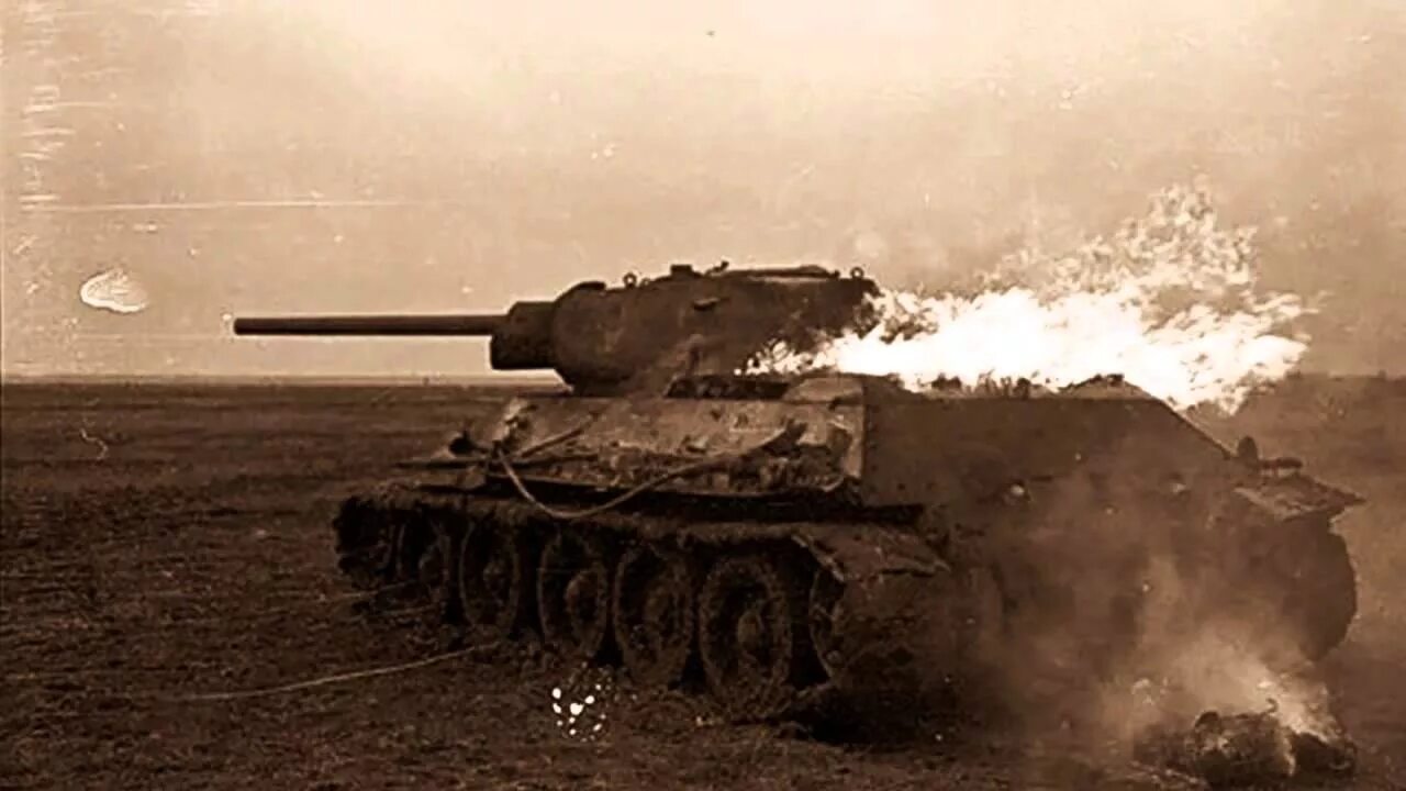 На поле танки грохотали автор. Танк т34 в поле. Горящий танк кв.