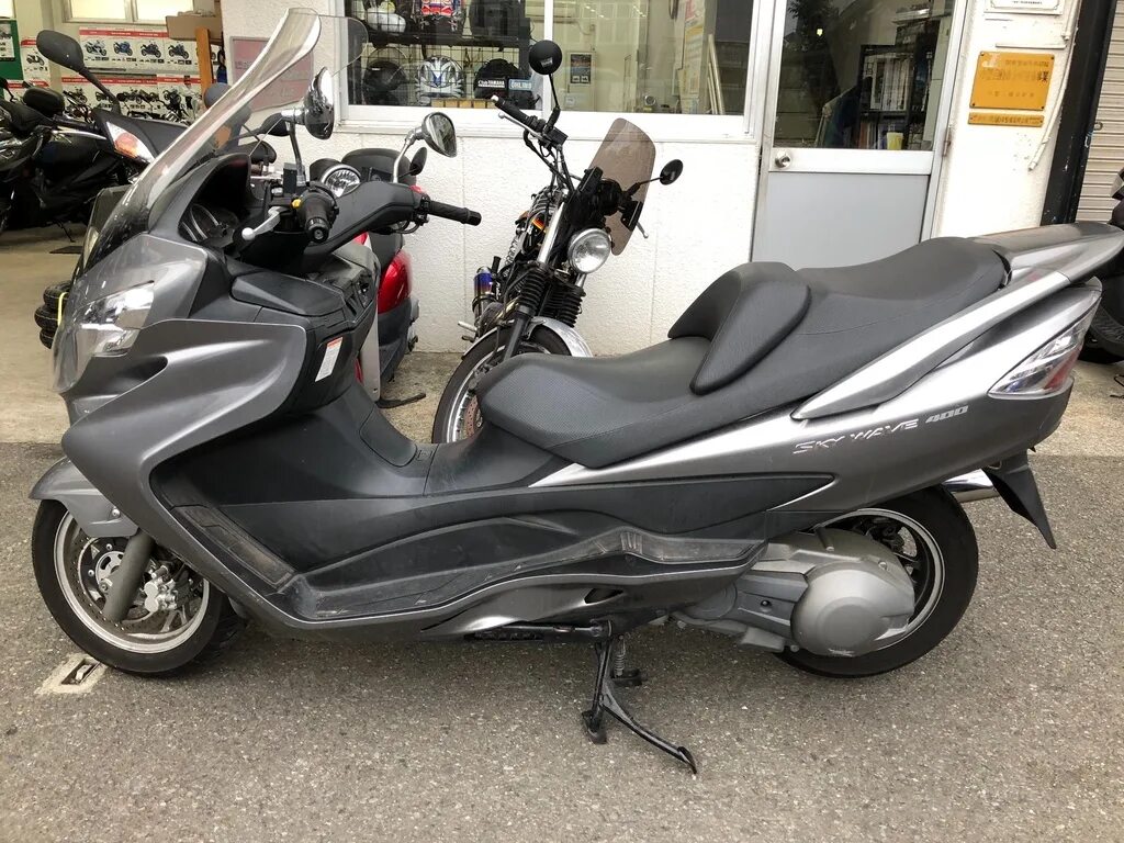 Сузуки макси скутер 600 скайвей. Suzuki burgman (skywave) 250. Скутер suzuki skywave burgman 650. Suzuki макси скутер skywave 650. Suzuki skywave 650.