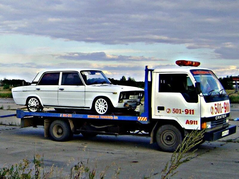 Служба 911 пенза. Эвакуатором лесу растут. Автомобиль службы 911. Эвакуатор омск 911. Грузовой эвакуатор камаз.