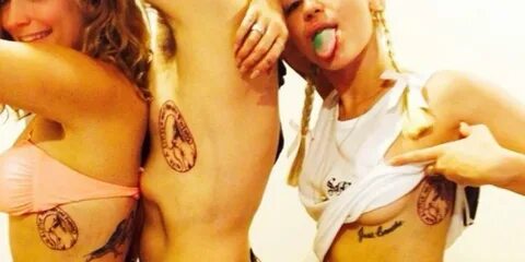 Slideshow miley cyrus boob tattoo.