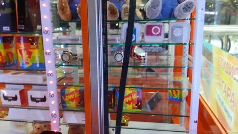 Выиграть телефон в автомате