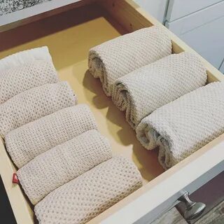 Как сложить полотенца в шкаф