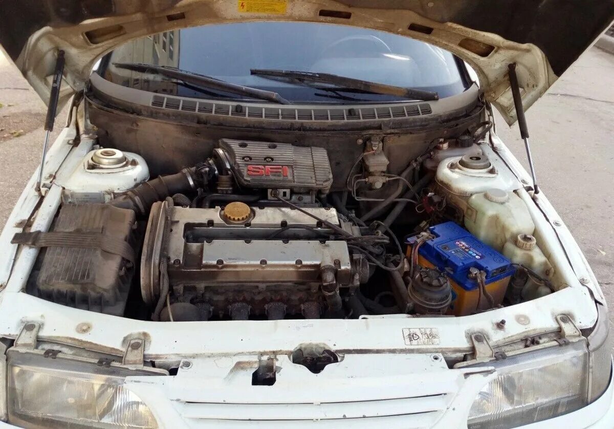 Ваз 2110 лукойл рейсинг двигатель. Ваз 2110 2. Ваз 2110 с двигателем опель. Лада 2110 двигатель. Лада 2110 jz.