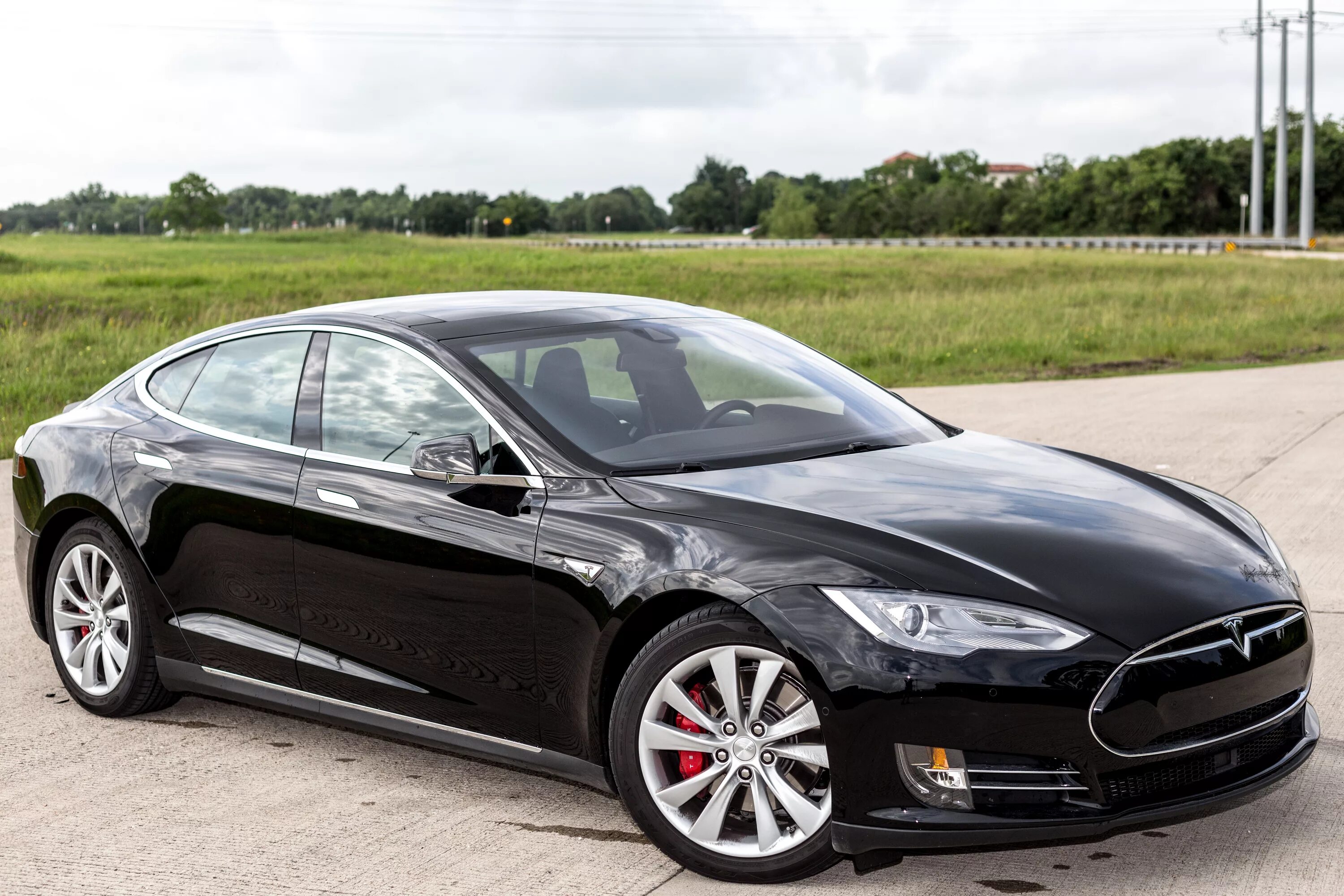 Машина тесла фото. Электромобиль Тесла. Автомобиль Tesla model s. Тесла модель s. Тесла автомобиль модель s 85.
