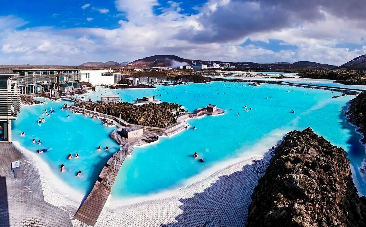 Голубая лагуна 4. Голубая Лагуна (Гриндавик, Исландия). Блю Лагун Исландия. Геотермальный курорт голубая Лагуна, Исландия. Исландия спа курорт голубая Лагуна.