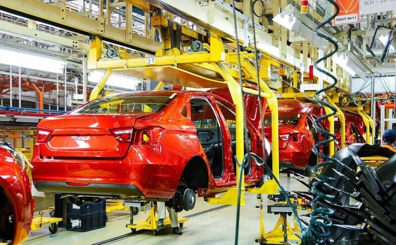 Мотор ea211. Автомобильная промышленность. Производство устройств для автомобиля. Производство устройств для автомобиля. Современный сборочный цех.