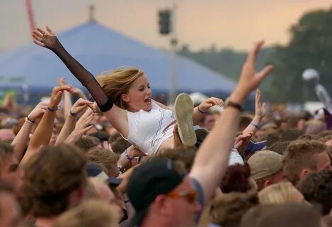 Times Newspapers Ltd. One teen enjoys a crowd surfing session in the early ...