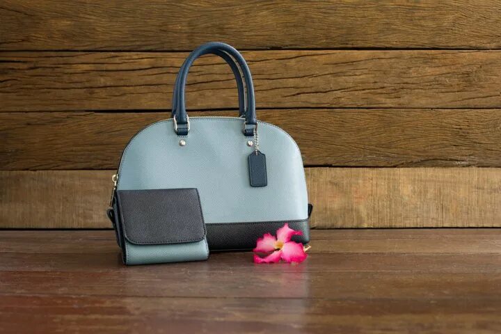 The bag on the table. Bag on the table. bag in table. the bag is on the table. the woman took the bag on the table..