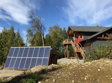 The generator and batteries are located in a Connex behind the solar panels...